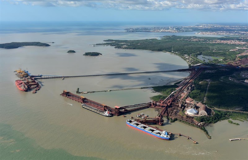 Container ship near Brazilian port with emissions and regulatory icons overlay