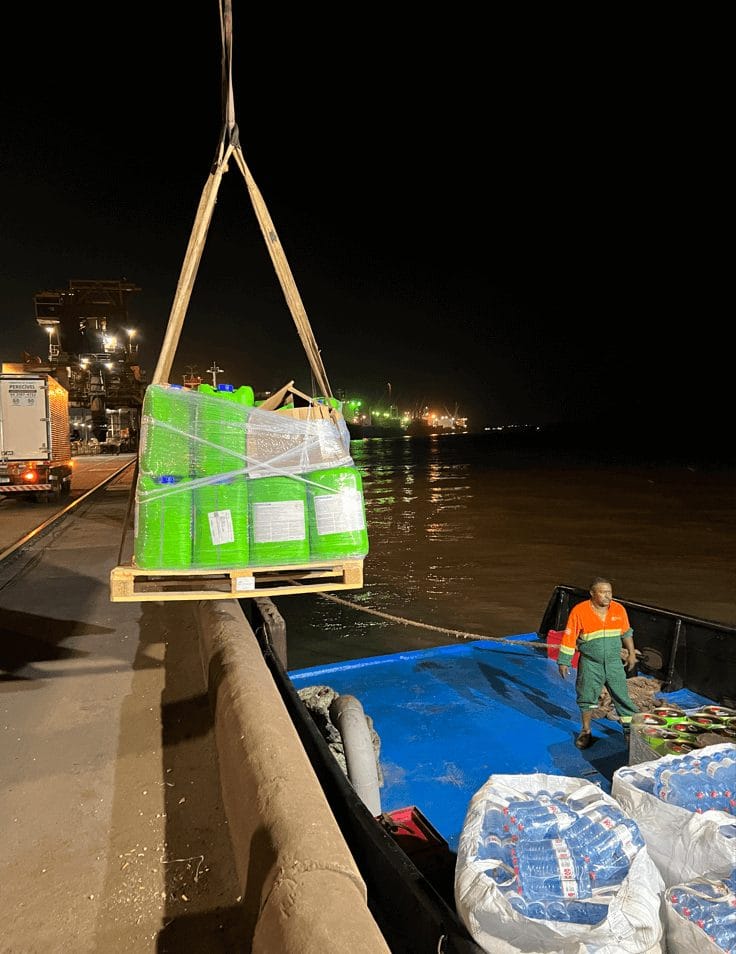 Chemicals and spare parts lifted at night for delivery to a vessel at the anchorage
